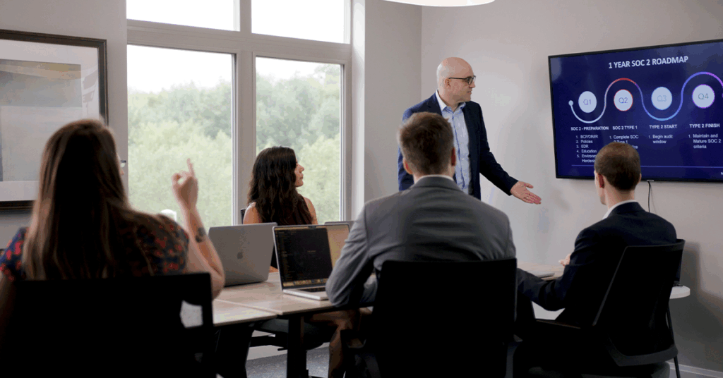 Virtual CISO Compliance: Fractional CISO Giving a SOC 2 Presentation