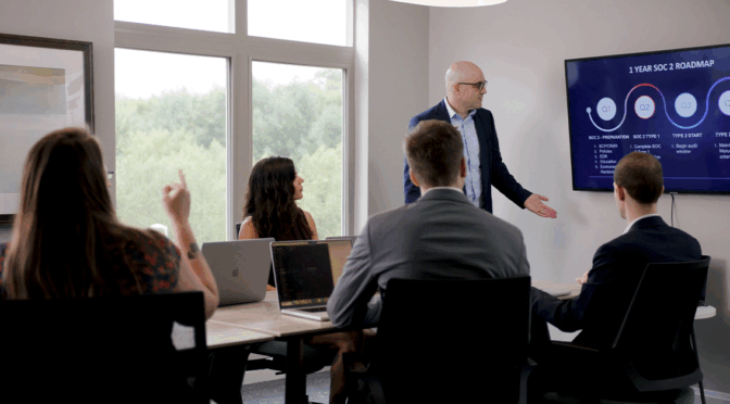 Virtual CISO Compliance: Fractional CISO Giving a SOC 2 Presentation